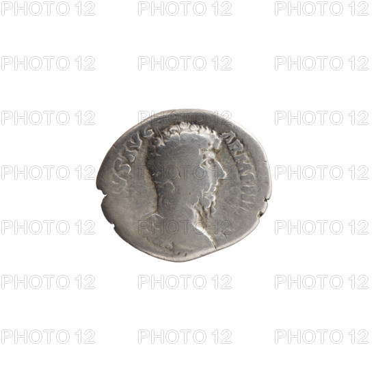 Denarius; issuer: Lucius Verus (130–169, Roman emperor 161–169). Obverse: Bust of Lucius Verus without a covering and in armor, facing right; inscription RVS AVG - ARMENIA, S all around. Reverse: Mars standing right, holding a spear in his right hand and resting his left on a round shield standing on the ground; inscription RP IIII - IMP II COS II all around. Date: 163–164. Culture/place: Roman Empire, Rome. Medium/function: coin. Dimensions: diameter 16.5–18.5 mm; weight 2.63 g; axis 180 degrees.