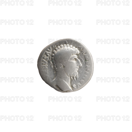 Denarius, Lucius Verus (130–169; Roman emperor 161–169), issuer: Lucius Verus. Obverse: Head of Lucius Verus without a cap to the right, inscribed ERVS AVG. Reverse: Mars stands to the right, holds a spear in his right hand, rests his left on a round shield standing on the ground, inscribed TR P V – IMP S II. Date: 164–165. Roman Empire (27 BC–476), Rome. Coin. Diameter 16.5–17.0 mm, weight 2.99 g, axis 180°.