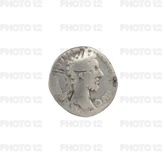 Denarius of Commodus (reigned 177–192), obverse: head of Commodus in laurel wreath to right, inscription 'M COMM, DVS AN - TONINVS AVG'; reverse: Roma seated on shield to left, holding Victoria in right hand and spear in left, inscriptions 'RP VI, MP - IIII COS III P'; dated 181 CE. Roman Empire; Rome. Silver coin; diameter 17.0 mm; weight 2.12 g; axis 0°.