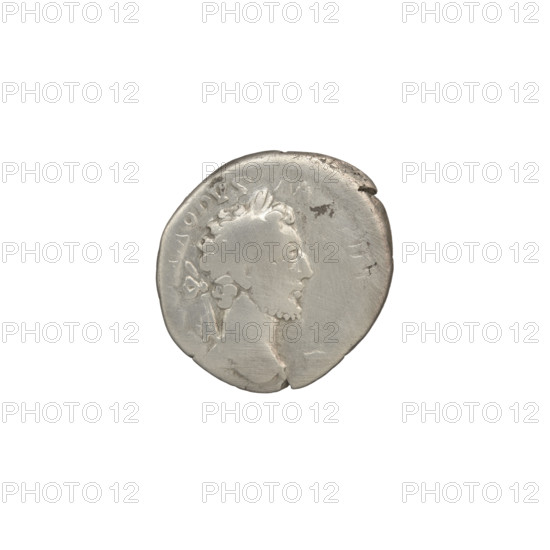 Denarius of Commodus (r. 177–192). Obverse: Head of Commodus in a laurel wreath facing right, legend OMMODVS - AN, IN, G. Reverse: Liberalitas standing left, holding an abacus in his right hand and a cornucopia in his left, legend LIB AVG V TR P VII IMP IIII COS III PP. Date: 181–182. Roman Empire, Rome. Coin; diameter 17.5 mm, weight 3.42 g, axis 195°.