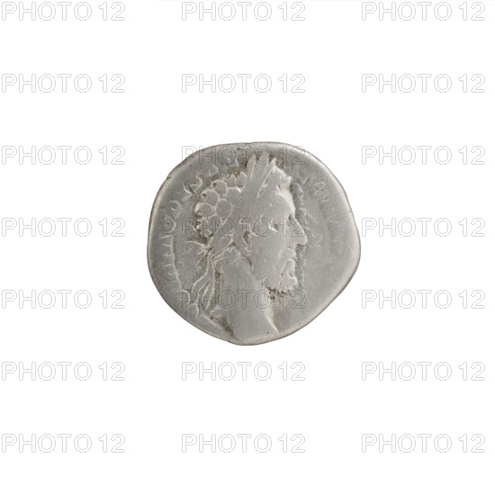 Denarius, Commodus (161–192; Roman emperor 177–192). Obverse: Head of Commodus in laurel wreath facing right, inscription 'COMMODVS ANTON AV' all around. Reverse: Mars standing right, holding a spear in his right hand and resting his left on a shield, inscriptions 'PM TR P VIIII' and 'OS IIII PP' all around. Date: 183–184. Roman Empire (27 BC–476), Rome. Coin; diameter 16.5–17.5 mm, weight 2.55 g, axis 180°.
