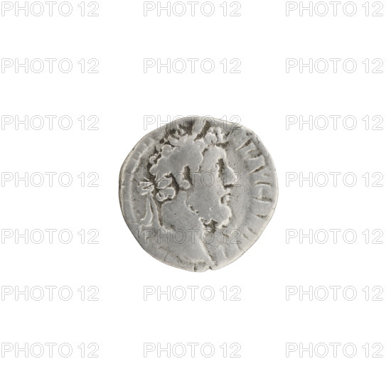 Denarius, Commodus (r. 177–192). Obverse: Head of Commodus in a laurel wreath facing right, legend M COMM AN, FEL AVG BRIT. Reverse: Minerva standing left, holding Victoria in her right hand, a spear in her left, round shield at left, trophy at right, legend IN VICT PM TRP X. Date: 188–189. Roman Empire (27 BC–476), Rome. Coin. Diameter 16.0–16.5 mm, weight 2.29 g, axis 345°.