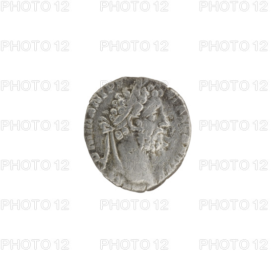 Denarius, Commodus (Roman emperor 177–192). Obverse: Head of Commodus in a laurel wreath facing right, legend COMM ANT PF AVG BRIT PP. Reverse: Naked Apollo standing right, left hand resting on a column, right hand behind his head, legend POL MON, XV; field marks COS -, 190. Roman, Rome; coin. Diameter 16.0–17.5 mm; weight 2.00 g; axis 0°.