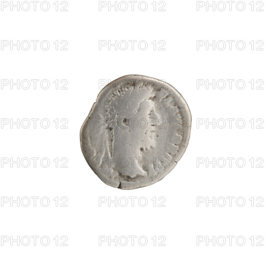 Denarius of Commodus (reigned 177–192). Obverse: Head of Commodus in a laurel wreath facing right, inscription M·COM—EL·AVG·BRIT·PP. Reverse: Roma seated on a shield facing left, holding Victoria in her outstretched right hand and a spear in her left, inscription ROM·FEL·PM·COS·VI. Date: 190–191. Roman Empire. Rome. Materials/format: coin; diameter 17.0–17.5 mm; weight 2.69 g; axis 15°. Subjects/iconography: Roman deities, Roma, Victoria, shields, spears; Commodus (iconography).