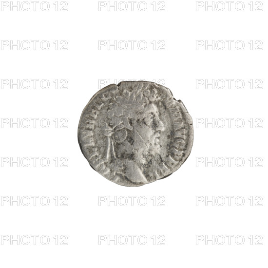 Denarius of Commodus (reigned 177–192). Obverse: Bust of Commodus in laurel wreath and drapery facing right, inscription L AEL AVREL CO - MM AVG P FEL. Reverse: Serapis in polos, standing frontally with head turned left, holding a branch in his right hand and a scepter in his left, inscription SERAPIDI. Date: 191–192. Roman Empire. Coin. Diameter 16.0–17.5 mm; weight 2.17 g; axis 195°.