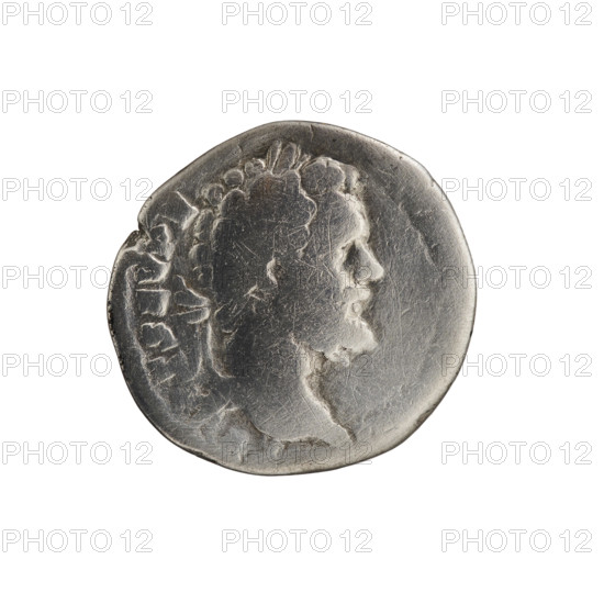 Denarius; obverse: Head of Septimius Severus with laurel wreath facing right, inscription T SEV PE (all around). Reverse: Genius half-naked standing left, holding a patera above a lit altar in his right hand and a cornucopia in his left, inscription V] - SPR (all around). Iconography: personifications, Genius, altars, paterae, cornucopias. Septimius Severus (Roman Emperor, 146–211). Roman Empire (27 BC–476), Rome. Coin. Diameter: 17.0–18.0 mm. Weight: 3.24 g. Axis: 180 degrees.