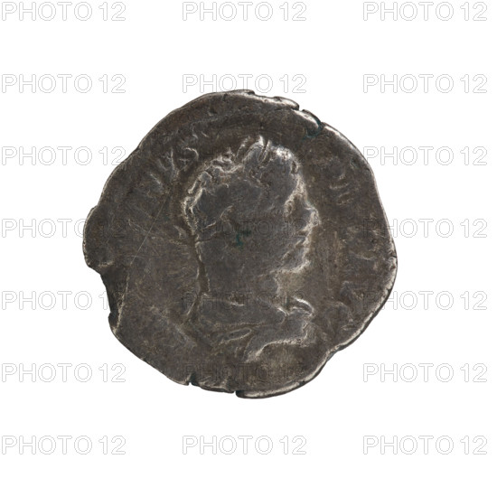 Denarius of Caracalla (188–217; Roman emperor 198–217). Obverse: ANTONINVS PIVS AVG — Bust of Caracalla facing right with a laurel wreath and paludamentum, pearl rim. Reverse: PONTIF TR P VII COS II — Mars wearing a helmet, military dress and a cloak on his shoulders stands upright, head turned left, resting his right hand on an oval shield standing on the ground, holding a spear in his left, pearl rim. Date: 205. Roman Empire (27 BC–476). Coin; bronze/metal. Diameter: 18.5–18.7 mm; weight: 1.88 g.