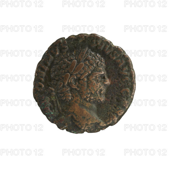 Caracalla (188–217; Roman emperor 198–217). Mars standing with a branch and a spear. Obverse: ANTONINVS PIVS AVG GERM — head of Caracalla with a laurel wreath facing right; pearl rim. Reverse: PM TR P XVII, S C — Mars wearing a helmet and military dress, turned left, right leg supported by a helmet, holding a branch in his right hand and a spear in his left; SC on both sides; pearl rim. Date: 214. Roman Empire (27 BC–476). Rome. Coin. Diameter 23.8–24.3 mm; weight 8.54 g.