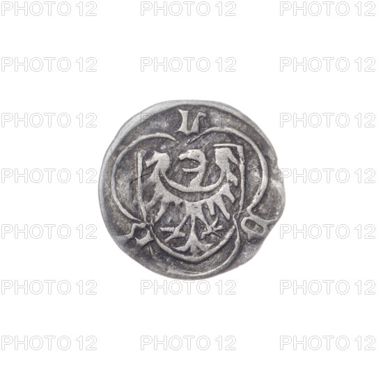 Obverse: In the trefoil a shield with the Silesian eagle; at the top and on the sides the letters L/B - D. Reverse: Bust of Saint Jadwiga with the image of a church. Louis II (Duke of Brzeg-Legnica; ca. 1380–1436). Date: 1399–1436. Region: Silesia, Duchy of Brzeg-Legnica-Wolów, Brzeg. Coin; diameter 12.8 mm; weight 0.28 g; axis 270°. Iconography: Silesian eagle, eagles, shields, coat of arms, letters L/B - D.