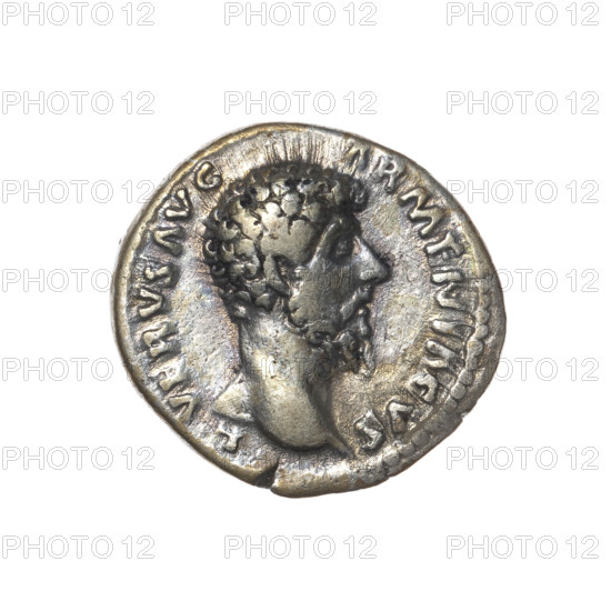 Denarius of Lucius Verus (130–169; Roman emperor 161–169). Obverse: Head of Lucius Verus bare, right, legend 'L VERVS AVG - ARMENIACVS'. Reverse: Mars standing right, holding a spear in his right hand and resting his left on a round shield on the ground, legend 'TR P IIII - IMP II COS II'. Date: 163–164. Roman Empire (27 BC–476), Rome. Coin; silver. Diameter c.17.5–18.5 mm; weight 3.30 g; axis 180°.