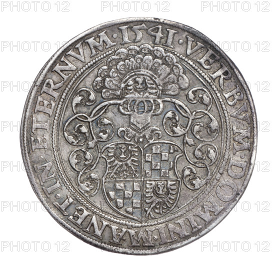 Thaler attributed to Michael Stoltz (fl. ca. 1540–1555), 1541. Obverse: male bust of Frederick II, Duke of Brzeg-Legnica (1480–1547), turned right, with beard and sideburns, wearing a bonnet and a coat with a wide collar fastened by a chain; rim inscription '+FRIDERI.DGDVX.SLESI.LEGENIC3.BRIGEN'. Reverse: four-field coat of arms of the Duchy of Legnica–Brzeg topped with a jeweled helmet with labres; rim inscription 'VERBVM.DOMINI.MANET.IN.ETERNVM.I54I.' Silver coin (thaler), diameter 39.6 mm, weight 27.93 g, axis 135°. Subjects/iconography: Piast dynasty, busts of the ruler, portraits of rulers, heraldic shield, Duchy of Legnica–Brzeg (coat of arms).