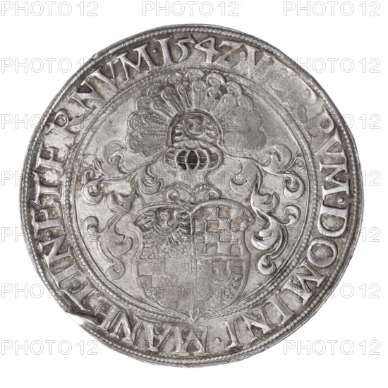 Thaler by Michael Stoltz (fl. ca. 1540–1555) depicting Frederick II, Duke of Brzeg-Legnica (1480–1547). Obverse: male bust of the ruler turned right, with a beard and sideburns, wearing a bonnet and a coat with a wide collar fastened on the chest with a chain; rim inscription: +FRIDERI.DGDVX.SLESI.LEGENICZ.BRIGEN. Reverse: four-field heraldic shield of the Duchy of Legnica–Brzeg topped with a jewel with labres and a helmet with labres; rim inscription: VERBVM.DOMINI.MANET.IN.ETERNVM.I54Z. Dated 1542. Region: Silesia, Duchy of Brzeg–Legnica–Wolów (Legnica). Coin; diameter 40.6 mm; weight 28.88 g; axis 315°. Subjects/iconography: Piast dynasty, portraits and busts of the ruler, shields, heraldic shield under a helmet with labres.