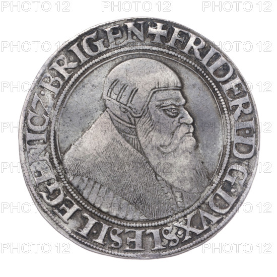 Thaler by Michael Stoltz (fl. ca. 1540–1555) depicting Frederick II, Duke of Brzeg-Legnica (1480–1547). Obverse: male bust turned right with beard and sideburns, wearing a bonnet and a coat with a wide collar; rim inscription '+FRIDERI.DGDVX.SLESI.LEGENICZ.BRIGEN'. Reverse: four-field coat of arms of the Duchy of Legnica–Brzeg topped with a jewel with labres; rim inscription 'VERBVM.DOMINI.MANET.IN.ETERNVM.1542'. Date: 1542. Silesia, Duchy of Brzeg-Legnica-Wolów, Legnica. Coin; diameter 40.4 mm, weight 28.72 g, axis 50°.