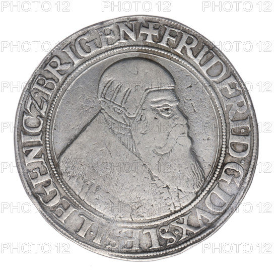 Thaler, Stoltz, Michael (fl. ca. 1540–1555). Obv.: Male bust turned right with a beard and sideburns, wearing a bonnet and a coat with a wide collar; rim inscription +FRIDERI.DGDVX.SLESI.LEGENICZ.BRIGEN. Rev.: Four-field coat of arms of the Duchy of Legnica–Brzeg topped with a jewel with labres; rim inscription VERBVM.DOMINI.MANET.IN.ETERNVM.I54Z. 1542. Silesia, Duchy of Brzeg–Legnica–Wolów, Legnica. Coin (thaler), dia. 40.8 mm, weight 28.69 g, axis 45°. Subjects: Frederick II (Duke of Brzeg–Legnica; 1480–1547), Piast family; iconography: busts, portraits, coats of arms, shield, coat of arms under a helmet with labres; portraits of rulers; bust of the ruler to the right.