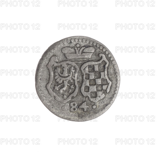 Obverse: In the beaded border a decorative cartouche with the Silesian eagle. Reverse: In the beaded border under the ducal mitre two curved coats of arms — Legnica and Brzeg, below '.84.' Maker/inscriptions: grosik, Jan Chrystian (Duke of Brzeg; 1591–1639), Jerzy Rudolf (Duke of Legnica; 1595–1653), Tuchmann, Christoph (fl. 1607–1610), publisher. Subjects/design: Piasts (family), Duchy of Legnica (coat of arms), duchy Brzeg (coat of arms), shields, coats of arms, eagles, Silesian eagle, coat of arms under the ducal mitre. Date: 1603–1621. Place: Silesia, Duchy of Brzeg–Legnica–Wolów, Zloty Stok. Object: Coin (grosik). Physical: diameter 16.7 mm; weight 0.63 g; axis 320°.