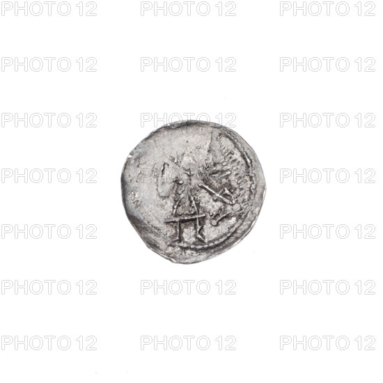 Denarius of Boleslaw III Krzywousty (prince of Poland; c. 1086–1138), c. 1125–1138. Obverse: within a beaded border, a knight in chain mail thrusting a spearhead into the jaws of an upside-down dragon. Reverse: within a triple beaded border, an isosceles cross topped with spheres (one with a dot); between its arms radiate two spheres (closer to the center smaller, the others larger—two of them dotted). Iconography: spearhead, equal-armed cross, crosses, chain mail, knights, dragon, Adalbert (St.; ca. 956–997), fight of good against evil, fight against pagans. Romanesque style. Coin; Poland, Kraków. Diameter 12.1–12.9 mm, weight 0.38 g.