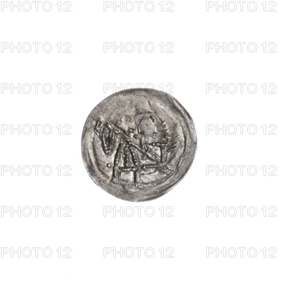 Denarius of Boleslaw III Krzywousty (prince of Poland; ca. 1086–1138), ca. 1125–1138. Obverse: in a beaded border, a knight in chain mail thrusting a spearhead into the jaws of an upside-down dragon; a dot under the knight's right elbow. Reverse: in a triple beaded border, an isosceles cross topped with balls, a dot at the crossing of the arms, and one ball between them. Iconography: spearhead, equal-armed cross, chain mail, knight, dragon; themes of martyrs, fight against pagans and the struggle between good and evil; Romanesque style; depicted saintly figure Adalbert (St.; ca. 956–997). Mint: Kraków, Poland. Coin; diameter 13.5–13.7 mm; weight 0.30 g.