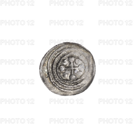 Denarius of Boleslaw III Krzywousty (prince of Poland; ca. 1086–1138), ca. 1125–1138. Obverse: in a beaded border, a knight in chain mail thrusting a spearhead into the jaws of an upside-down dragon; a dot under the knight's right elbow. Reverse: in a triple beaded border, an isosceles cross topped with balls; a dot at the crossing of the arms and one ball between them. Iconography: spearhead, equal-armed cross, chain mail, mouth, knight, dragons; themes of martyrs, fight against pagans, struggle between good and evil; Romanesque style; possible reference to St. Adalbert. Poland, Kraków. Coin; diameter ca. 13.5–13.7 mm; weight 0.30 g.