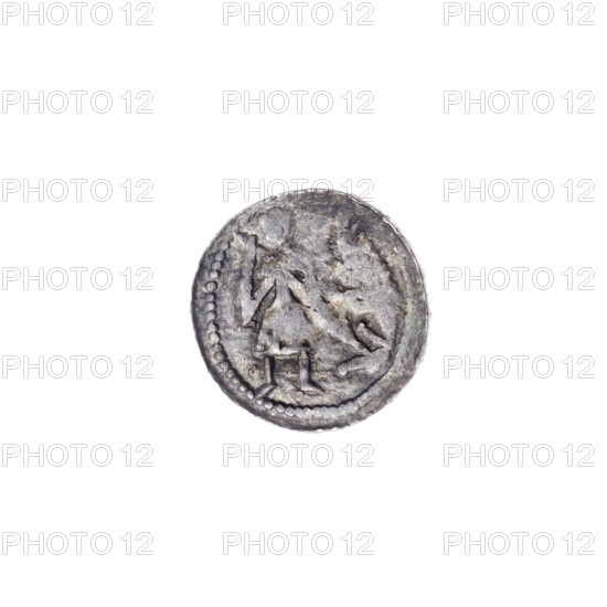 Denarius of Boleslaw III Krzywousty (prince of Poland; ca. 1086–1138). Romanesque coin, ca. 1125–1138, Kraków, Poland. Obverse: in a beaded border, a knight in chain mail thrusting a spearhead into the jaws of an upside-down dragon (knight, chain mail, dragon, jaws, spears, fight between good and evil, Adalbert/saintly/martyral associations). Reverse: in a triple beaded border, an isosceles (equal-armed) cross topped with balls, with a ball between its arms. Denomination: denarius. Diameter 13.1–13.4 mm; weight 0.53 g. Romanesque style; iconography includes allegory, knight, dragons, martyrs.