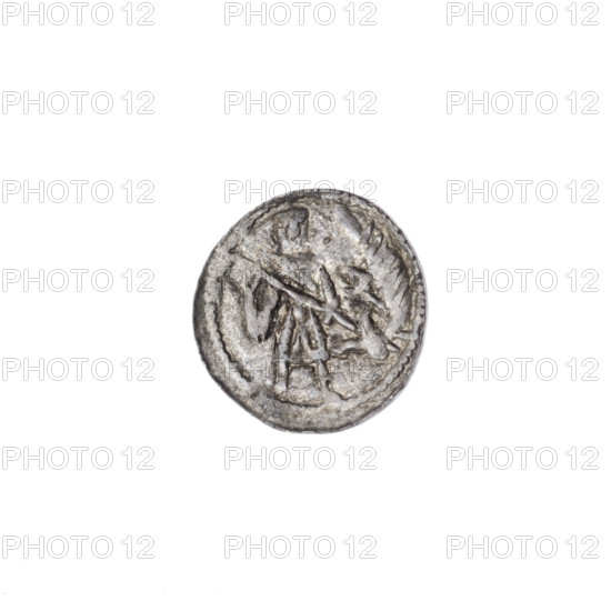 denarius, Boleslaw III Krzywousty (prince of Poland; 1086/1107–1138), allegories, equal-armed cross (iconographic), spearhead (issue mark), chain mail, mouth (iconographic), martyrs, knight (iconographic), dragons, Romanesque (style), dragon (iconographic), Adalbert (St.; ca. 956–997), fight against pagans, fight between good and evil, spear, Middle Ages, spears. Obv. In the beaded border, a knight in chain mail thrusting a spearhead into the jaws of a dragon turned upside down. Rv. In the triple beaded border, an isosceles cross topped with balls; between its arms, one ball (one of them has a dot). One arm intersects the other at approx. 1/3 of its length. ca. 1125–1138, Kraków, Poland. Coin: denarius; diameter 13.1 mm; weight 0.45 g.