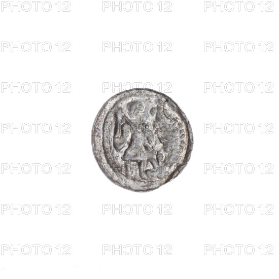 Denarius of Boleslaw III Krzywousty (prince of Poland; ca. 1125–1138). Obverse (in a beaded border): a knight in chain mail thrusting a spearhead into the jaws of an upside-down dragon. Reverse (in a triple beaded border): an isosceles cross topped with balls; between its arms, two quarters with two radiating balls each (smaller ones nearer the center, larger ones farther), and the other two quarters with one ball each (one ball dotted). Iconography: equal-armed cross, spearhead (issue mark), crosses, chain mail, mouth, martyrs, knight, dragons/dragon, mouths; Romanesque style; themes include fight against pagans and fight between good and evil; association with St. Adalbert (ca. 956–997). Date: ca. 1125–1138. Place: Poland, Kraków. Coin (denarius). Diameter: 12.0–12.4 mm. Weight: 0.30 g.
