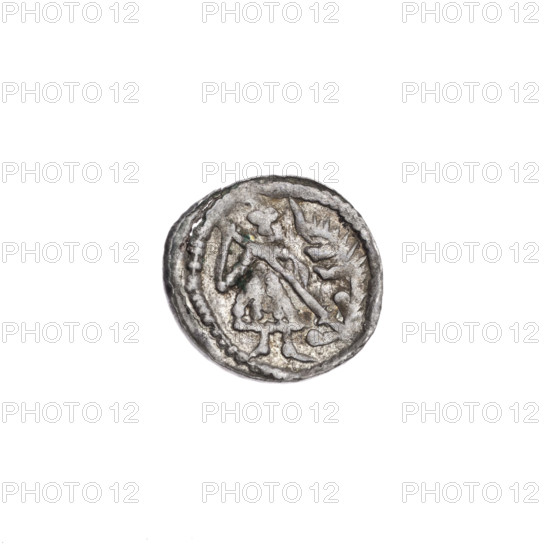 denarius, Boleslaw III Krzywousty (prince of Poland; 1086/1107–1138), allegories, equal-armed cross (iconographic), crosses, chain mail, spearhead (issue mark), mouth (iconographic), martyrs, knight (iconographic), Romanesque (style), knights, dragon (iconographic), dragons, mouths, Middle Ages, Adalbert (St.; ca. 956–997), fight against pagans, spear, fight between good and evil, spears. Obverse: in the beaded border, a knight in chain mail thrusting a spearhead into the jaws of a dragon turned upside down. Reverse: in the triple beaded border, an isosceles cross topped with balls; between its arms, one ball. ca. 1125–1138. Poland, Kraków. Coin (denarius). Diameter 12.7–13.5 mm. Weight 0.47 g.