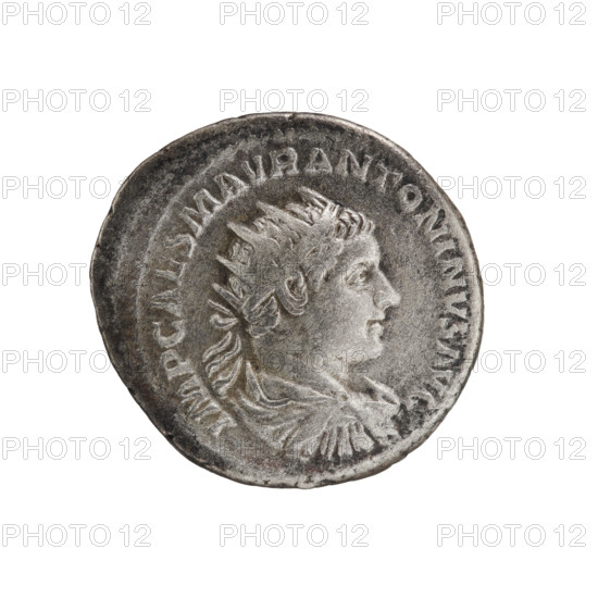 Antoninian of Elagabalus (reigned 218–222). Obverse: Bust of Elagabalus facing right, wearing a radiant crown, armor and paludamentum; legend IMP CAES M AVR ANTONINVS AVG, pearl border. Reverse: Victoria running right, holding a wreath in her right hand and a palm branch in her left; legend VICT OR ANTONINI AVG, pearl border. Dated 218–219. Roman Empire. Coin (silvered), diameter ca. 21.0–22.5 mm, weight 5.70 g, axis 180°.