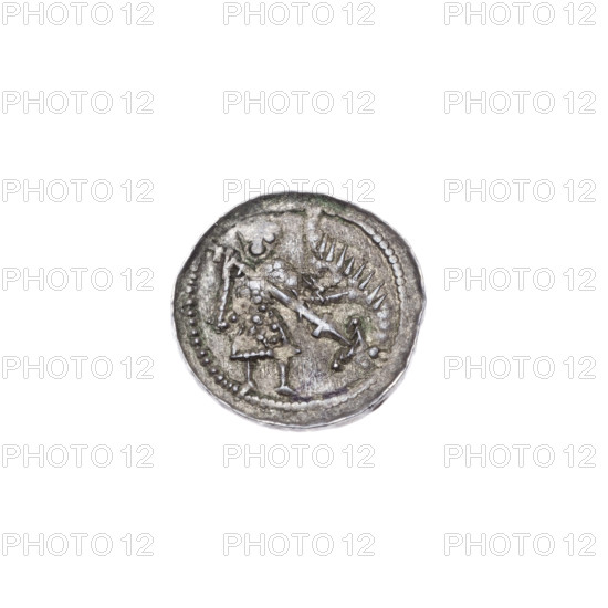 Denarius, Boleslaw III Krzywousty (prince of Poland; 1086–1138). Obv.: In the beaded border, a knight in chain mail thrusting a spearhead into the jaws of an upside-down dragon; imagery includes allegories, knights, chain mail, spear, spears, fight between good and evil, fight against pagans, martyrs, Saint Adalbert (Adalbert; ca. 956–997), dragons, jaws, Romanesque style. Rv.: In the triple beaded border, an equal-armed (isosceles) cross topped with spheres (two of them with one dot each); between its arms, one sun; issue mark: spearhead. Date: ca. 1125–1138. Place: Poland, Kraków. Coin; diameter 12.7–13.1 mm; weight 0.56 g. State of preservation: very good.