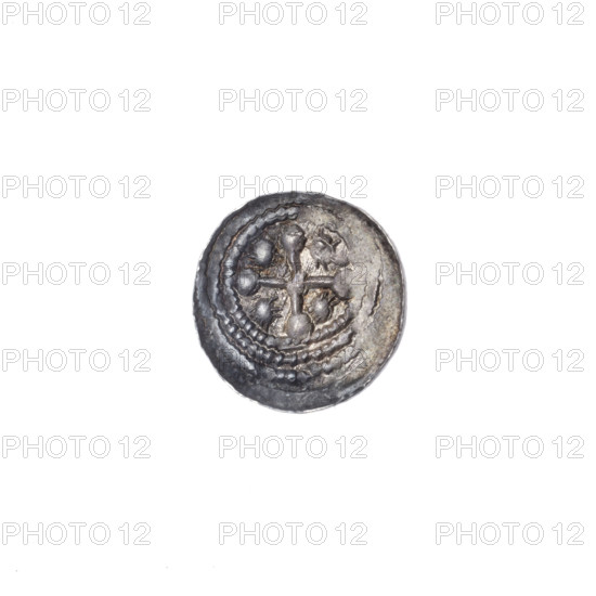 denarius, Boleslaw III Krzywousty (prince of Poland; 1086–1138), chain mail (iconographic), spearhead (issue mark), equal-armed cross (iconographic), allegories, crosses, mouth (iconographic), chain mail, knight (iconographic), martyrs, dragons, knights, mouths, dragon (iconographic), Middle Ages, Romanesque (style), fight between good and evil (iconographic), fight against pagans (iconographic), spear (iconographic), spears, Adalbert (St.; ca. 956–997). Av. In the beaded border, a knight in chain mail thrusting a spearhead into the jaws of an upside-down dragon. A ball under the knight's right elbow. Rv. In the triple beaded border, an isosceles cross topped with balls. A ball at the intersection of the arms. Between them, a single sun. ca. 1125–1138, Poland, Kraków, coin, diameter 12.5 mm, weight 0.35 g