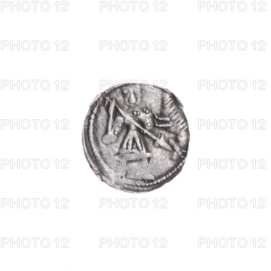 denarius, Boleslaw III Krzywousty (prince of Poland; 1086–1138), Romanesque, ca. 1125–1138. Av. In the beaded border, a knight in chain mail thrusting a spearhead into the jaws of an upside-down dragon. Rv. In the triple beaded border, an isosceles cross topped with two balls on each arm (smaller ones closer to the center, larger ones touching them). Between its arms, closer to the center, one ball, and closer to the ends, one sun. Iconography: chain mail, spearhead, equal-armed cross, crosses, jaws, dragon, knight, martyrs, fight between good and evil, fight against pagans, spears, Adalbert (St.; ca. 956–997). Coin; Poland, Kraków. Diameter 12.3–13.1 mm; weight 0.60 g.