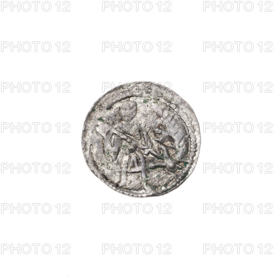 Denarius of Boleslaw III Krzywousty (prince of Poland; c. 1086–1138). Obverse: within a beaded border, a knight in chain mail thrusting a spearhead into the jaws of an upside-down dragon. Reverse: within a triple beaded border, an isosceles cross topped with balls; between its arms, one ball (three of them with one dot). Iconography: chain mail, spearhead, equal-armed cross, crosses, mouth, knight, dragon, martyrs, fight between good and evil, Adalbert (Saint; c. 956–997), fight against pagans. Style: Romanesque. Date: c. 1125–1138. Place: Poland, Kraków. Coin (denarius). Diameter: 12.9–13.3 mm. Weight: 0.57 g.
