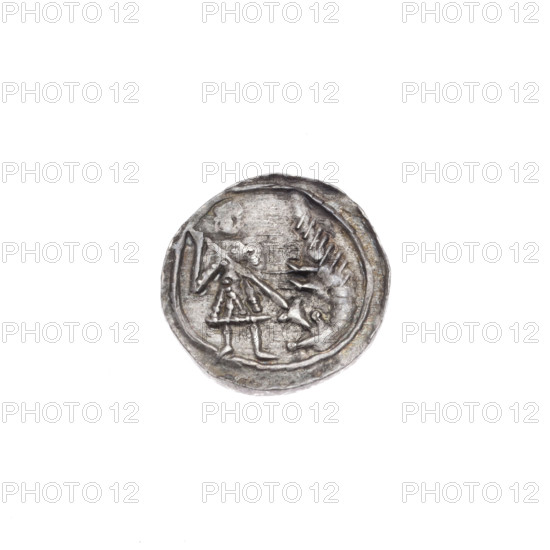 Denarius of Boleslaw III Krzywousty (prince of Poland; 1086–1138 / 1107–1138). Obverse: within a linear border, a knight in chain mail thrusting a spearhead into the jaws of an upside-down dragon. Reverse: within a triple beaded border, an isosceles cross topped with balls (two bearing one dot each); between its arms one ball (two bearing one smaller dot each); one arm intersects the other at approximately 1/3 of its length. Attributes/imagery: spearhead (issue mark), equal-armed cross, crosses, allegories, chain mail, mouths, martyrs, knight, dragons, Romanesque style, dragon, knights, mouths, Middle Ages, Adalbert (St.; ca. 956–997), fight between good and evil, fight against pagans, spear, spears. Date: c. 1125–1138. Place: Poland, Kraków. Coin. Diameter 13.2–13.8 mm. Weight 0.65 g.