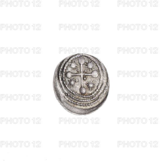 Denarius, Boleslaw III Krzywousty (prince of Poland; ca. 1125–1138). Obverse: in a beaded border, a knight in chain mail thrusting a spearhead into the jaws of an upside-down dragon. Reverse: in a triple beaded border, an isosceles cross topped with balls; between its arms, one small ball near the center and a sun nearer the ends. Iconography: allegories, knight, dragons/dragon, fight between good and evil, fight against pagans, spear/spearhead, crosses, chain mail, martyrs, jaws, Adalbert (St. ca. 956–997). Style: Romanesque, Middle Ages. Coin; Poland, Kraków. Diameter: 11.9–12.6 mm. Weight: 0.62 g. State of preservation: very good.