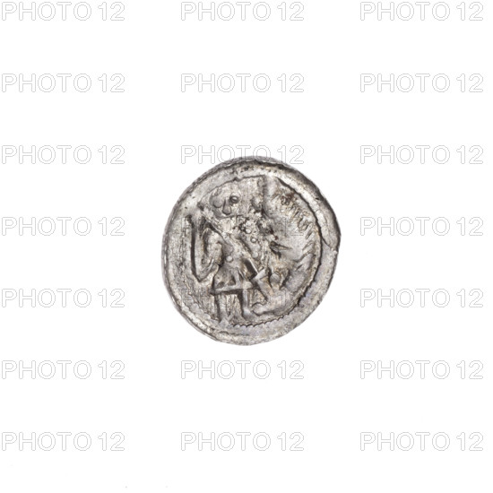 Denarius of Boleslaw III Krzywousty (Prince of Poland, c. 1107–1138). Obverse: in a beaded border, a knight in chain mail thrusting a spearhead into the jaws of an upside-down dragon — allegory of a knight (martyr/Adalbert), fight between good and evil/pagans; spearhead (issue mark). Reverse: in a triple beaded border, an isosceles cross topped with balls; between its arms one ball, and closer to the center between three arms two smaller balls. Romanesque style. c. 1125–1138. Poland, Kraków. Coin; diameter ~12.0–12.5 mm; weight 0.50 g.