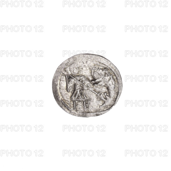 Denarius, Boleslaw III Krzywousty (prince of Poland; 1086–1138). Obverse: within a beaded border, a knight in chain mail thrusting a spearhead into the jaws of an upside-down dragon (Allegory; fight between good and evil; fight against pagans; St. Adalbert referenced; Romanesque style; knights, martyrs, dragons). Reverse: within a triple beaded border, an isosceles cross topped with spheres (one with a dot); between its arms radiate two spheres (smaller ones nearer the center, larger ones—two with dots). Issue mark: spearhead. Equal-armed cross. Coin, c. 1125–1138, Poland (Kraków). Diameter 12.7–13.3 mm; weight 0.45 g.