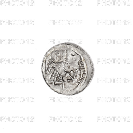 Denarius of Boleslaw III Krzywousty (prince of Poland; 1086–1138). Obverse: In the beaded border, a knight in chain mail thrusting a spearhead into the jaws of an upside-down dragon; motifs include spearhead (issue mark), equal-armed cross, chain mail, crosses, martyrs, mouth, knight, dragons, mouths, dragon, fight between good and evil, spears, Adalbert (St.; ca. 956–997), spear, Middle Ages, fight against pagans, Romanesque style. Reverse: In the triple beaded border, an isosceles cross topped with balls; between its arms, one sun. Date: ca. 1125–1138. Place: Kraków, Poland. Coin. Diameter: 13.1–13.3 mm. Weight: 0.58 g.