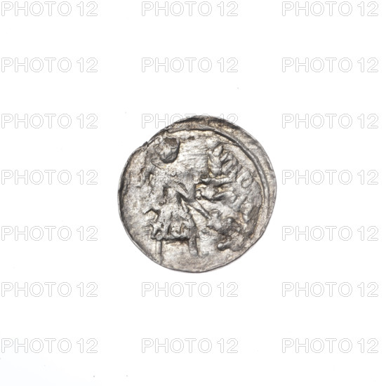 denarius, Boleslaw III Krzywousty (prince of Poland; 1086–1138; ruled 1107–1138), Romanesque, Middle Ages, ca. 1125–1138, Poland, Kraków, coin, diameter 12.1–12.9 mm, weight 0.50 g. Obv. In the beaded border, a knight in chain mail thrusting a spearhead into the jaws of an upside-down dragon; dot above the knight's left foot. Iconography: spearhead, chain mail, jaws, crosses, martyrs, knight, knights, dragon, dragons, fight between good and evil, fight against pagans, spears, Adalbert (St.; ca. 956–997). Rv. In the triple beaded border, an isosceles cross topped with balls; a single ball between its arms.