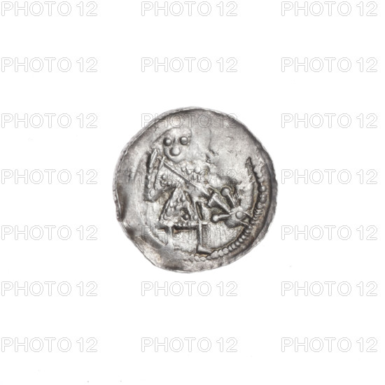 denarius, Boleslaw III Krzywousty (prince of Poland; 1107–1138), allegories, Boleslaw III Krzywousty (prince of Poland; 1086–1138), spearhead (issue mark), chain mail (iconographic), chain mails, dragons, mouth (iconographic), knight (iconographic), crosses, equal-armed cross (iconographic), Middle Ages, Romanesque (style), dragon (iconographic), martyrs, knights, mouths, Adalbert (St.; ca. 956–997), spear (iconographic), fight against pagans (iconographic), fight between good and evil (iconographic), good (state of preservation), spears. Obverse: in the beaded border, a knight in chain mail thrusting a spearhead into the jaws of a dragon turned upside down. Reverse: in the triple beaded border, an isosceles cross topped with spheres (two of them with one dot each). Between its arms, single suns (three of them with one dot each; the fourth may also have one but is obscured by under-striking). ca. 1125–1138. Poland, Kraków. Coin. Diameter 13.1–13.8 mm. Weight 0.63 g.