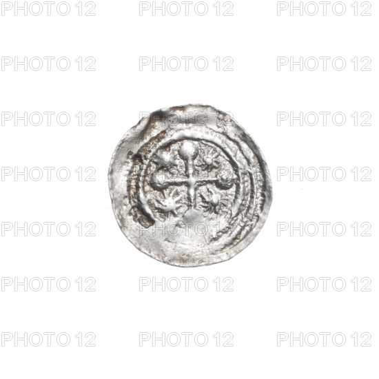 Denarius of Boleslaw III Krzywousty (prince of Poland; ca. 1086–1138), ca. 1125–1138. Obverse: in a beaded border, a knight in chain mail thrusting a spearhead into the jaws of an upside-down dragon. Reverse: in a triple beaded border, an isosceles cross topped with spheres (two bearing a dot each); between its arms, single suns (three with a dot each; the fourth possibly dotted but obscured by under-striking). Iconography includes knight, chain mail, spearhead/spears, dragons, mouths, crosses, equal-armed cross, sun motifs; themes of fight against pagans and fight between good and evil; Romanesque style; references to martyrs and St. Adalbert. Coin; Poland, Kraków. Diameter 13.1–13.8 mm; weight 0.63 g.