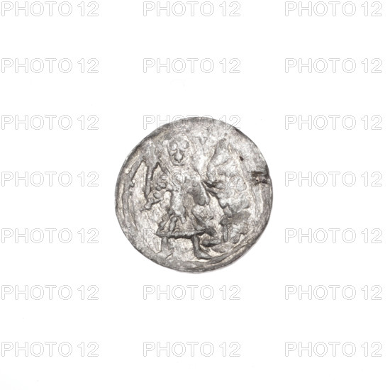 Denarius, Boleslaw III Krzywousty (prince of Poland; ca. 1107–1138). Obverse: in a linear border, a knight in chain mail thrusting a spearhead into the jaws of an upside-down dragon. Reverse: in a triple beaded border, an isosceles cross topped with balls; at the intersection of the arms a ball; between the arms one ball (one with a dot); in one quarter two balls. Iconography: spearhead, chain mail, equal-armed cross, mouths, martyrs, knight, dragons; themes of fight between good and evil and fight against pagans; Romanesque style; depiction associated with Saint Adalbert (ca. 956–997). ca. 1125–1138. Poland, Kraków. Coin; diameter 12.5–12.8 mm; weight 0.43 g.