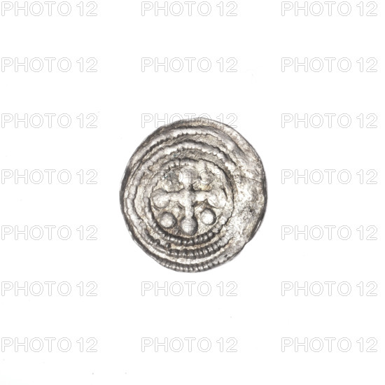 denarius, Boleslaw III Krzywousty (prince of Poland; 1086–1138 / reign 1107–1138), Romanesque style, allegorical imagery of fight between good and evil and fight against pagans, depiction of knight in chain mail spearing a dragon (dragon turned upside down), reference to St. Adalbert (ca. 956–997), inscriptions/marks: spearhead (issue mark), crosses, balls; Obverse: in beaded border, knight in chain mail thrusting a spearhead into the jaws of an inverted dragon. Reverse: in triple beaded border, an isosceles cross topped with balls; at the intersection of the arms, a ball; between the arms, one ball. ca. 1125–1138, Poland, Kraków; coin; diameter ~12.1–12.4 mm; weight 0.33 g