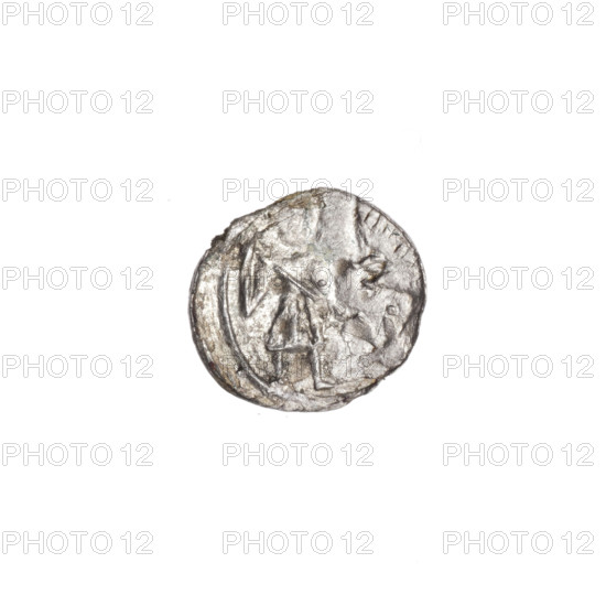 Denarius, Boleslaw III Krzywousty (prince of Poland; 1086–1138). Obverse: in the linear border, a knight in chain mail thrusting a spearhead into the jaws of an upside-down dragon. Reverse: in the triple beaded border, an isosceles cross topped with balls; at the intersection of the arms, a ball; between the arms, one sun. Iconography includes allegories, equal-armed cross, chain mail, spearhead (issue mark), crosses, mouth, knight, martyrs, dragons, Romanesque style; themes: fight between good and evil, fight against pagans; associated figure: Adalbert (Saint; ca. 956–997). Date: ca. 1125–1138. Place: Poland, Kraków. Object: coin (denarius). Diameter: 11.4–12.2 mm. Weight: 0.21 g.