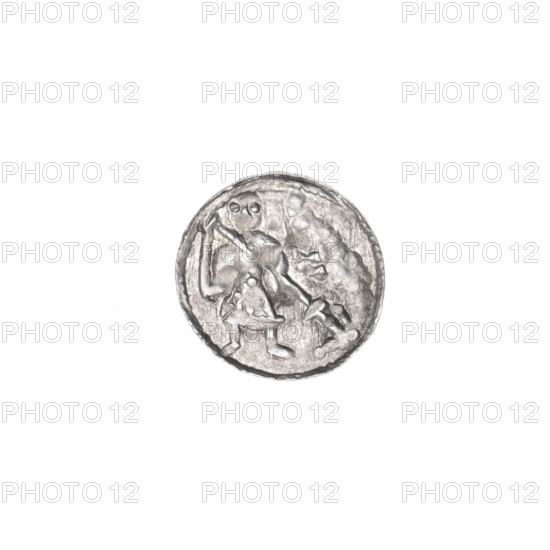 Denarius of Boleslaw III Krzywousty (prince of Poland; 1086–1138/1107–1138). Obverse: within a beaded border, a knight in chain mail thrusting a spearhead into the jaws of an upside-down dragon. Reverse: within a triple beaded border, an isosceles cross topped with spheres; a sphere at the intersection of the arms and additional spheres between the arms (some dotted). Iconography: knight, chain mail, spearhead, dragon, jaws, equal-armed cross, martyrs, Adalbert (Saint; ca. 956–997), fight between good and evil/fight against pagans, Romanesque style. Date: ca. 1125–1138. Place: Kraków, Poland. Coin (denarius). Diameter: 11.8–12.1 mm. Weight: 0.32 g.