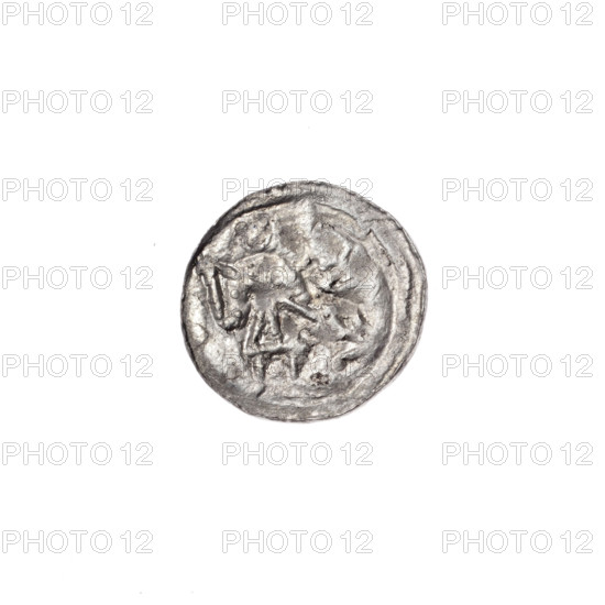 denarius, Boleslaw III Krzywousty (prince of Poland; 1107–1138), allegories, equal-armed cross, crosses, spearhead (issue mark), chain mail, mouth, martyrs, Romanesque (style), dragons, knight, dragon, Adalbert (Saint; ca. 956–997), Middle Ages, spear, fight against pagans, fight between good and evil. Obv.: In the beaded border, a knight in chain mail thrusting a spearhead into the jaws of a dragon turned upside down. Rv.: In the triple beaded border, an isosceles cross topped with balls; between its arms, one ball. ca. 1125–1138, Poland, Kraków; coin; diameter 12.3–12.9 mm; weight 0.37 g