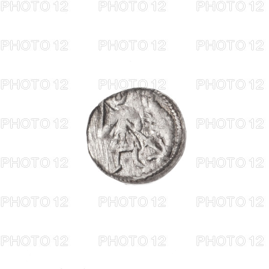 Denarius of Boleslaw III Krzywousty (prince of Poland; 1086–1138). Obverse: within a beaded border, a knight in chain mail thrusting a spearhead into the jaws of an upside-down dragon (allegory: fight between good and evil, fight against pagans; depicted knight possibly Saint Adalbert); reverse: within a triple beaded border, an isosceles cross topped with balls, with a ball between its arms. Romanesque style; Middle Ages; issue mark: spearhead. Ca. 1125–1138. Poland, Kraków. Coin (denarius). Diameter 12.4–12.8 mm; weight 0.41 g.