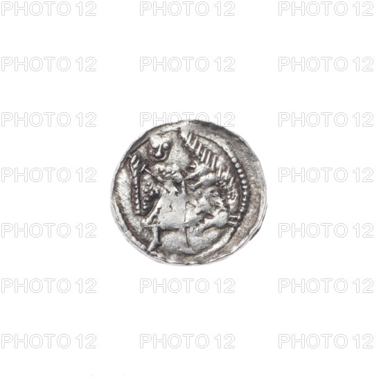 denarius, Boleslaw III Krzywousty (prince of Poland; 1086–1138), equal-armed cross, chain mail, allegories, crosses, jaws, spearhead (issue mark), martyrs, knight, Romanesque (style), dragons, knights, Middle Ages, fight between good and evil, fight against pagans, very good (state of preservation), dragon, Adalbert (Saint; ca. 956–997), spears. Obv. In the beaded border, a knight in chain mail thrusting a spearhead into the jaws of a dragon turned upside down. Rv. In the triple beaded border, an isosceles cross topped with spheres (two of them with one dot each). Between its arms, one sun. ca. 1125–1138, Poland, Kraków, coin, diameter 12.1–12.7 mm, weight 0.57 g