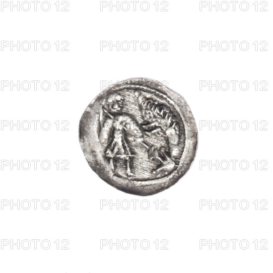 denarius, Boleslaw III Krzywousty (prince of Poland; 1086–1138), allegories, equal-armed cross, crosses, chain mail, spearhead (issue mark), jaws, martyrs, knight, Romanesque (style), knights, dragon(s), Middle Ages, fight between good and evil, Adalbert (Saint; ca. 956–997), spears, fight against pagans, spear. Obv.: In the beaded border, a knight in chain mail thrusting a spearhead into the jaws of an upside-down dragon. Rv.: In the triple beaded border, an isosceles cross topped with spheres (one with a dot); between its arms, one sphere (two with a dot). ca. 1125–1138; Kraków, Poland; coin; diameter 13.3–13.8 mm; weight 0.48 g.
