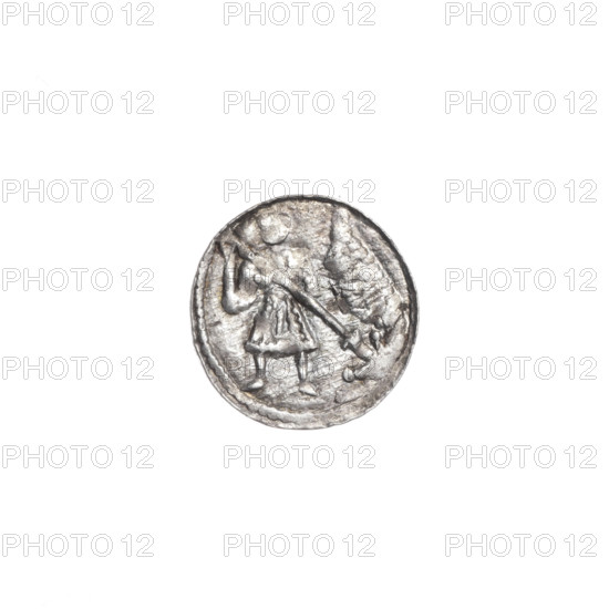 denarius, Boleslaw III Krzywousty (prince of Poland; 1086–1138), spearhead (issue mark), allegories, equal-armed cross, chain mail, crosses, martyrs, dragons, Romanesque (style), jaws, dragon, knights, Middle Ages, fight against pagans, spear, Adalbert (Saint; ca. 956–997), fight between good and evil, spears. Obv.: In the beaded border, a knight in chain mail thrusting a spearhead into the jaws of an upside-down dragon. Rv.: In the triple beaded border, an isosceles cross topped with balls; between its arms, one ball. ca. 1125–1138. Poland, Kraków. Coin. Diameter 11.9–12.1 mm; weight 0.38 g.