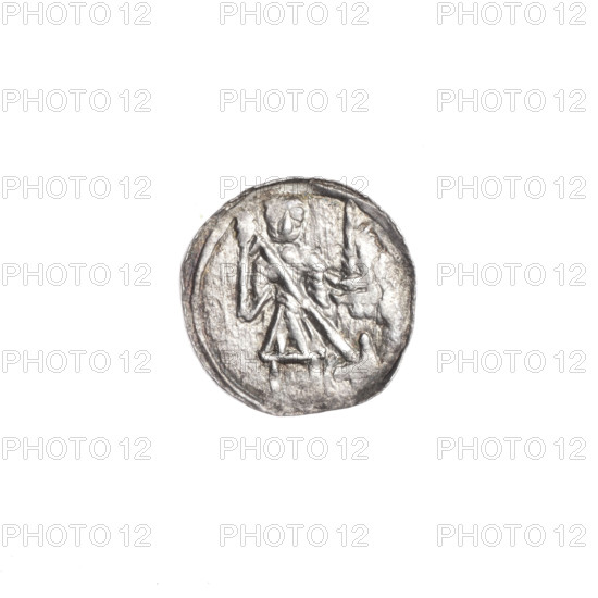 Denarius of Boleslaw III Krzywousty (prince of Poland; ca. 1107–1138). Obverse: in a linear border, a knight in chain mail thrusting a spearhead into the jaws of an upside-down dragon. Reverse: in a triple beaded border, an isosceles cross topped with spheres (one with a dot); between its arms, one sphere (two with dots). Allegorical imagery referencing Adalbert (Saint; ca. 956–997), knights, martyrs, fight between good and evil, and fight against pagans. Romanesque style. Issue mark: spearhead. Date: ca. 1125–1138. Place: Kraków, Poland. Coin (denarius). Diameter: 12.2–12.8 mm. Weight: 0.43 g.