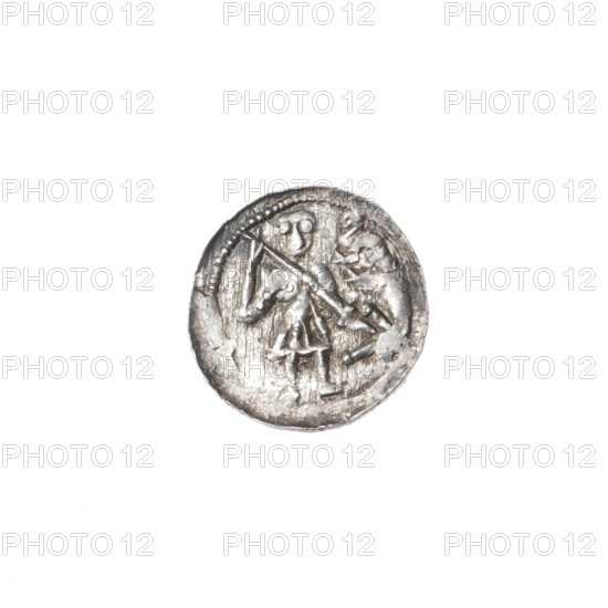 Denarius of Boleslaw III Krzywousty (prince of Poland; 1107–1138). Obverse: in a beaded border, a knight in chain mail thrusting a spearhead into the jaws of an upside-down dragon. Reverse: in a triple beaded border, an isosceles cross topped with spheres (three of them with one dot); between its arms radiate two spheres (smaller ones closer to the center, larger ones — one with a dot); one quarter near the center contains an additional dot. Allegorical imagery: dragons, knights, fight between good and evil; motifs include spearhead (issue mark), equal-armed cross, chain mail, crosses. Associated figures: Adalbert (Saint; ca. 956–997). Romanesque style. Date ca. 1125–1138. Poland, Kraków. Coin; diameter 12.3–12.8 mm; weight 0.43 g.
